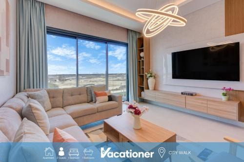 Vacationer Holiday Homes l Luxurious 1 Bed l City Walk Mall, Coca-Cola Arena