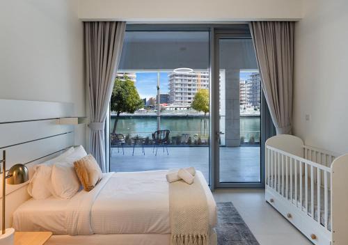 Allsopp & Allsopp - 2-Bedroom with Maids room Apartment in Canal Front Residence 5, Al Wasl 02