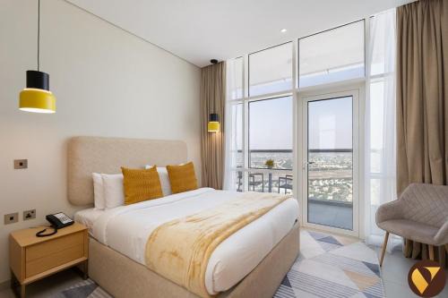 Vogue Vacation Homes, Novotel Residences JVT near Springs Souk Mall, One Bedroom apartment with Balcony and Vibrant Community View, Access to all Amenities