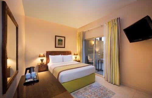 Al Hamra Village Hotel